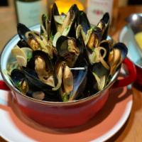 MUSSELS MARINIÈRE · The classic: white wine, Vermont butter, parsley, garlic, shallots