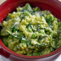 VEGETARIAN RISOTTO · Arborio rice, vegetable broth, English pea puree, spinach, courgettes, peas. Add Parmesan at...