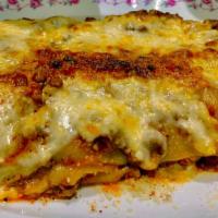 FRENCH LASAGNA · Ground veal-beef Bolognese, béchamel, mozzarella & Parmesan cheese
