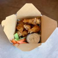 Chicken Wings · Choice of House Buffalo, Spicy Dry Rub or Korean BBQ. Served with house blue cheese, rancho ...