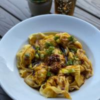 Pork and Shrimp Wontons · Pork and Shrimp Wontons tossed in a savory soy & oil sauce
