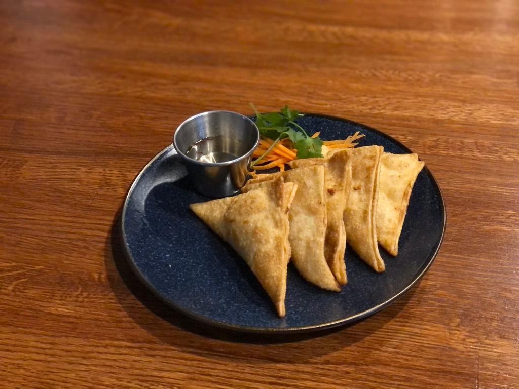 Jalapeno  crab cream cheese wontons (5) · Chinese dumpling that comes with filling.