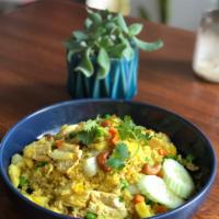 Pineapple Fried Rice  · Fried rice with onions ,carrots, peas, fresh pineapple and cashews. Choice of chicken or veg...
