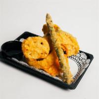 Vegetable Tempura · 6 pieces of vegetable tempura.