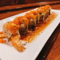 *Sexy Salmon Roll · Spicy crab salad, shrimp tempura, seared salmon, cream cheese, avocado, masago, scallions, s...