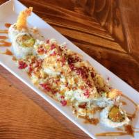 Crunch Roll · Shrimp tempura, crab salad and avocado topped with crunchy flakes, drizzled with spicy mayo ...
