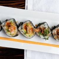Spider Roll · Deep fried soft shell crab, cucumber, avocado, gobo, radish sprouts and crab salad.