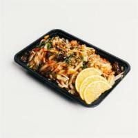 Yaki Udon · Stir-fried udon noodles with bean sprouts, cabbage and carrots. Tossed with house yaki udon ...