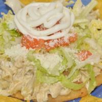Sope Grande · Homemade fried sope topped with  your choice of meat, beans, lettuce, sour cream, cheese and...