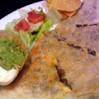 Meat Quesadilla · Made with flour tortilla, monterrey/jack cheese, served with a side of sour cream, guacamole...