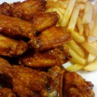 Chicken Wings · Served with fries, ranch or bleu cheese  and celery sticks.