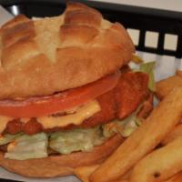 Chicken Sandwich · Brioche bun, crispy chicken, swiss cheese, bacon, lettuce, tomatoes, secret sauce and mayo, ...