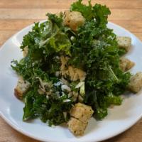 Kale Caesar Salad · Parmesan, housemade croutons, anchovy dressing