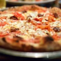 Basque Pizza  · Tomato sauce, chorizo, peppers, onions and fresh mozzarella.