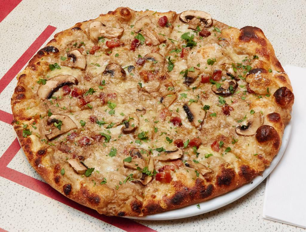 Forrestiere Pizza  · Wild mushrooms, fromage blanc, pancetta and truffle oil.