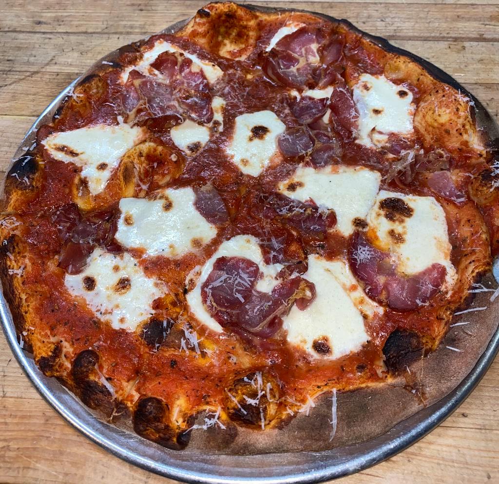 La Capicola Pizza  · Tomato sauce, fresh mozzarella and spicy capicola.