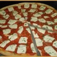 7. Margherita Gourmet Pizza · The traditional Neapolitan pizza with homemade fresh mozzarella cheese, fresh tomato basil s...
