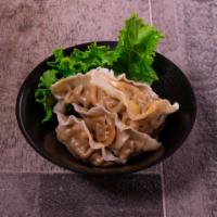 8 Pieces Steamed Dumplings Dinner  · Pork or vegetable.