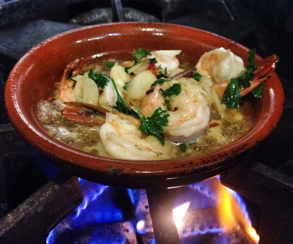 Gambas al Ajillo · Shrimp in garlic butter. 