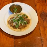 Ground Beef · Seasoned ground beef. All soft tacos served with onion, cilantro.  Crispy tacos served with ...