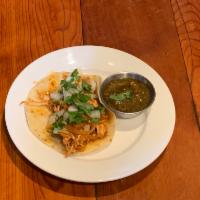 tinga taco (chicken) · All soft tacos served with onion, cilantro.  Crispy tacos served with pico, lettuce and chee...