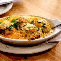 Wild Rice Mushrooms  · Served with mornay sauce. 