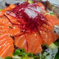 Salmon Salad · Served with daikon, spring mix, cucumber, and cherry tomato with Japanese dressing.