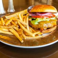 Bistro Burger · USDA Choice Angus beef or flame grilled chicken breast. Served on a toasted brioche bun with...