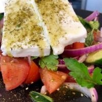 Greek Salad · Tomato, cucumber, onion, kalamata olives, fresh oregano, parsley, olive oil, lemon, balsamic...