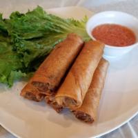 A1. Cha Gio - Eggrolls · Egg rolls. Mixture of ground pork, carrots, noodles and mushroom wrapped in a spring roll an...