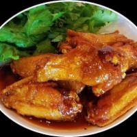 A4. Canh Ga Chien · Fried wings. Mixture of six winglets stir-fried in your choice of sauce.