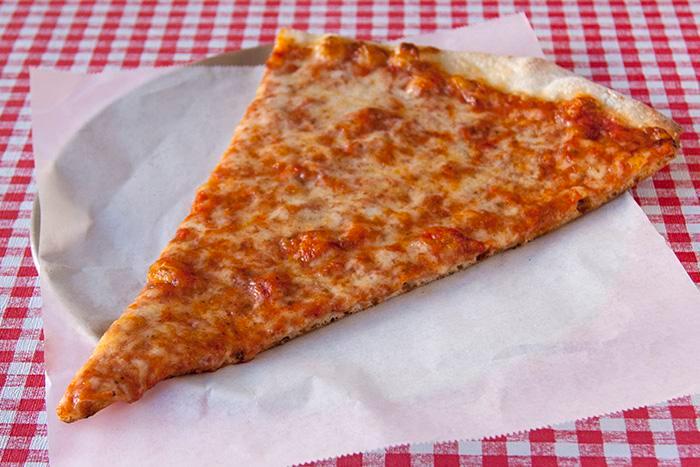NY Style Thin Crust Pizza Slice · Lift, fold and eat this cheesy slice on crispy crust.