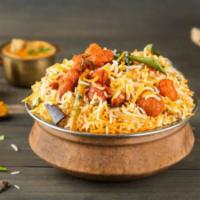 Boneless Chicken 65 Biryani · Aromatic basmati rice cooked in simmer with boneless  chicken and home special spices