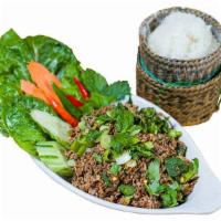 9A. Larb Seen (Beef) · A savory minced beef seasoned with lime, chilli powder, fish sauce, roasted rice powder and ...