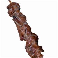 12. Ping Seen single skewer no rice · Laotian style of marinated beef cut into pieces,  single skewered on bamboo and grilled.