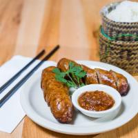 15. Sai Gork (Lao Pork Sausages) · Popular Lao pork sausage. A delicious combination of pork,lemongrass, chillies, garlic, cila...