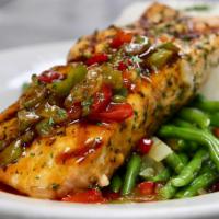 Salmon · Grilled or baked salmon served with onion, bell peppers in sweet chili sauce .
