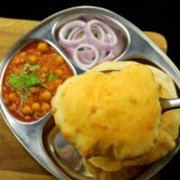 Chole Bhatore · Spicy chickpeas curry and fried Indian bread.