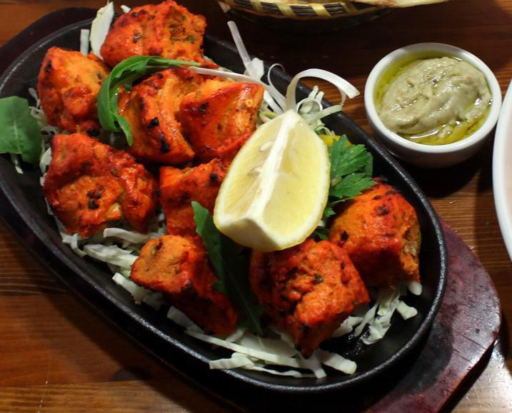 Chicken Tikka Full · Tender chunks of boneless chicken seasoned with heavenly spices and BBQ in traditional clay oven.