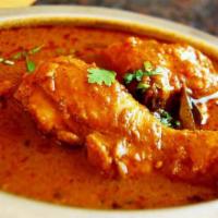 Curry · Indian style curry made with freshly ground spices.