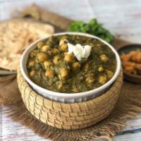 Saag Chana Curry · An Indian classical dish with creamy and spiced spinach and chickpeas.