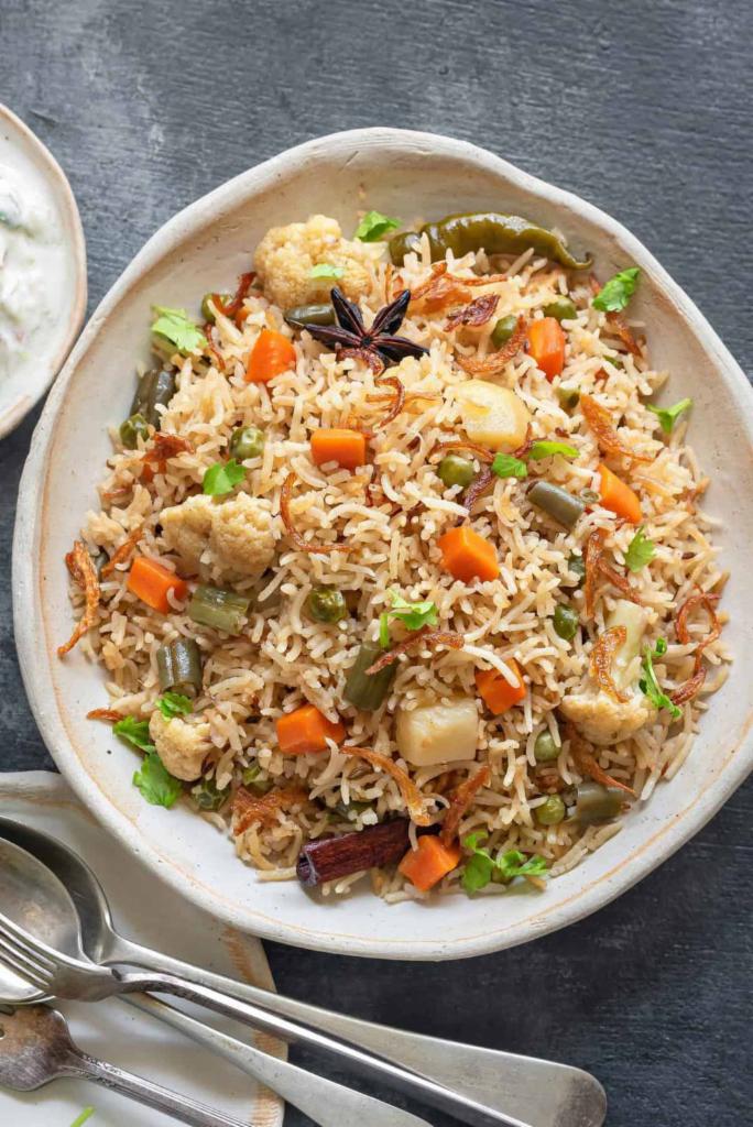 Vegetable Biryani · Punjabi styled curried mix vegetables with basmati rice(NOT A HYDERABADI BIRYANI)