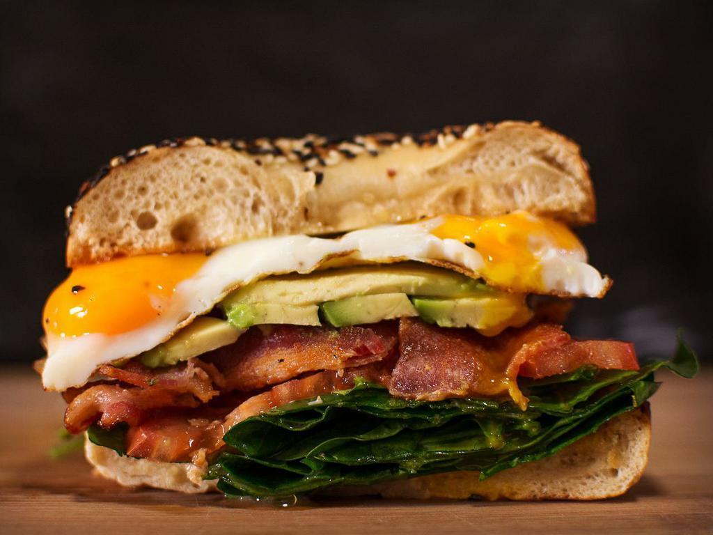 Supreme Breakfast Bagel · bagel of your choice, scrambled eggs, bacon, mushroom, spinach, tomato, cheese