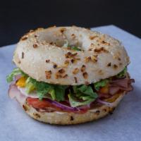 Club Bagel · bagel of your choice, Ham, turkey, bacon, lettuce, tomato, cheese, mayo, mustard