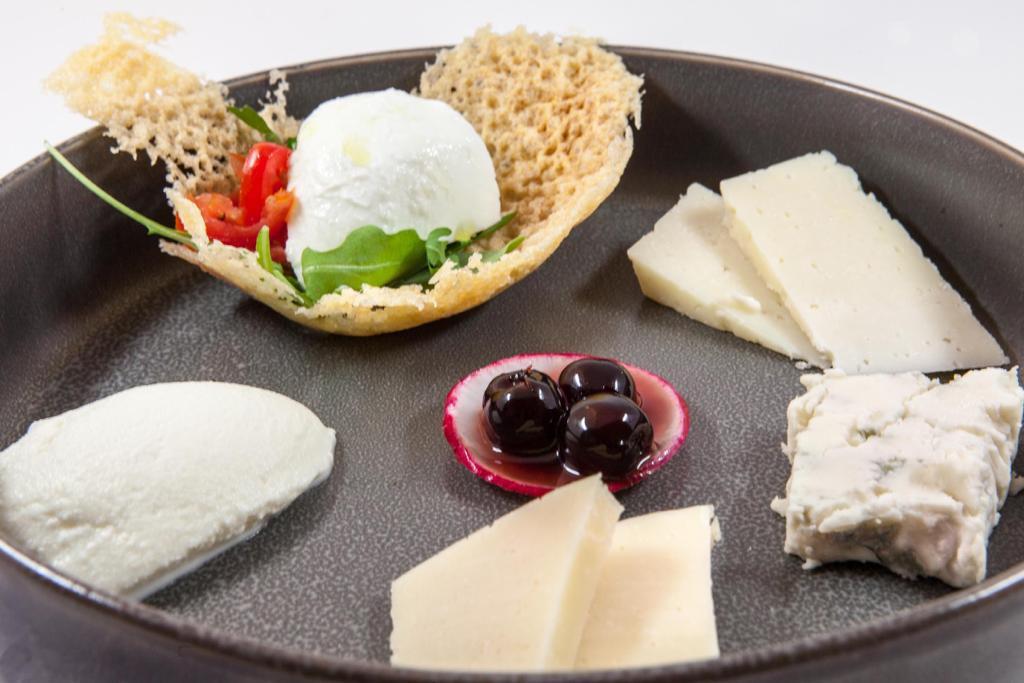 Cheese Selection · Pecorino, Parmigiano, Gorgonzola, burratta and ricotta.