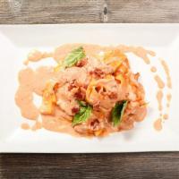 Pappardelle Amor di Pasta · Mushrooms, bacon and pink vodka sauce.
