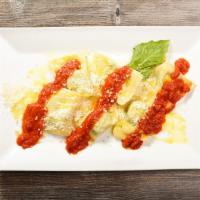 Ravioli Ricotta and Spinach · Sage and butter or tomato sauce or pink vodka sauce.