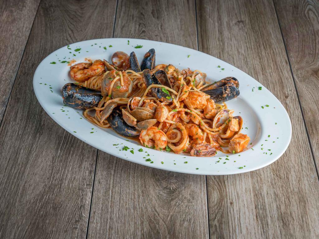 Spaghetti Seafood · Calamari, salmon, clams, mussels, octopus and shrimp.