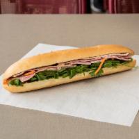 1. Best Baguette Special Sandwich · Classic combination of pate, premium ham, pork and head cheese.