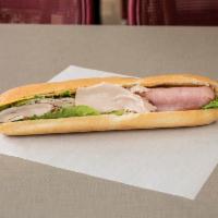 17. Ham, Turkey and Cheese Sandwich · Generous amount of lean oven roasted turkey slice.